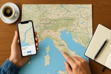 Viaggiatore pianifica un itinerario europeo con mappa e smartphone